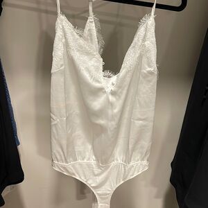 White satin body suit